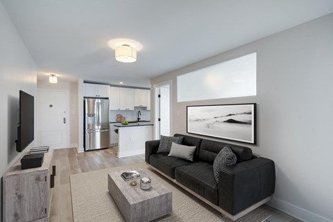 a living room with a couch and a coffee table